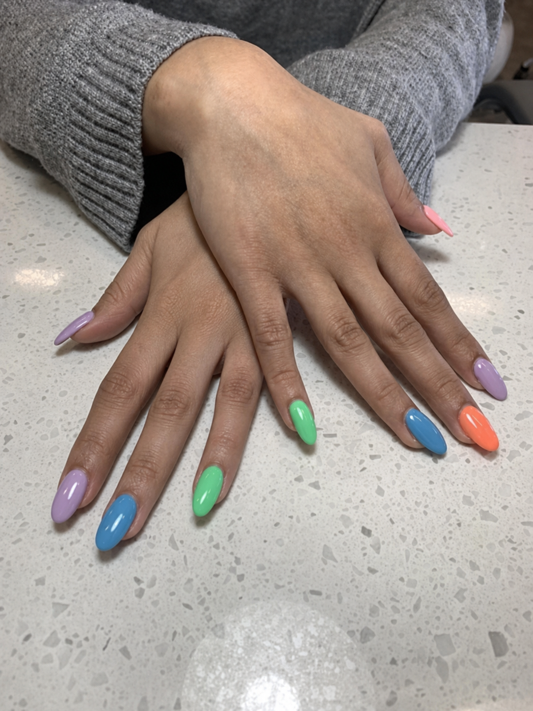 Colorful pastel manicure created at River Nails